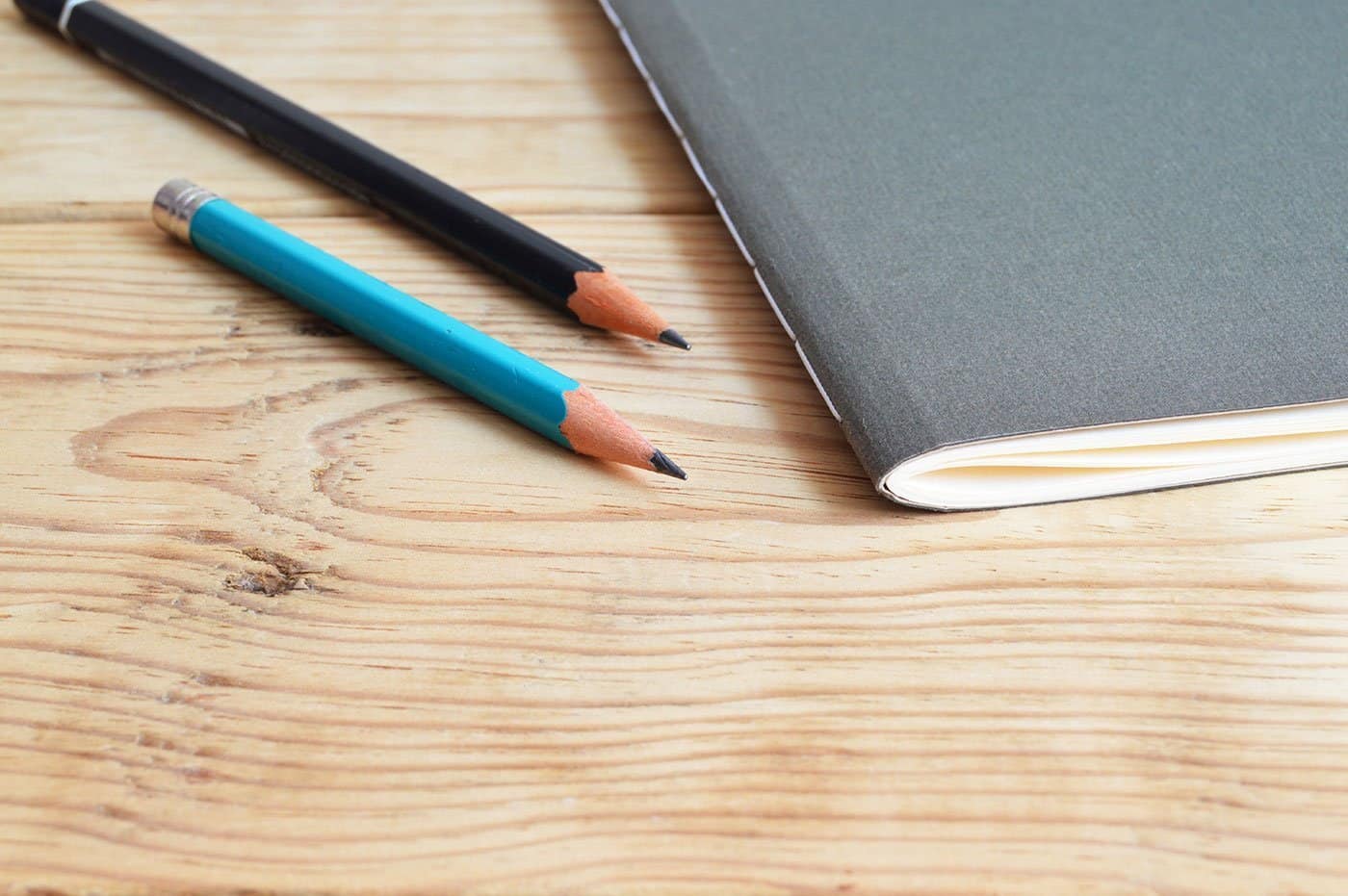 Stock photo of pencils and notebook